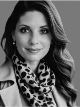 Headshot of Delilah Carleton, Founder and CEO of Estimate AI Solutions
